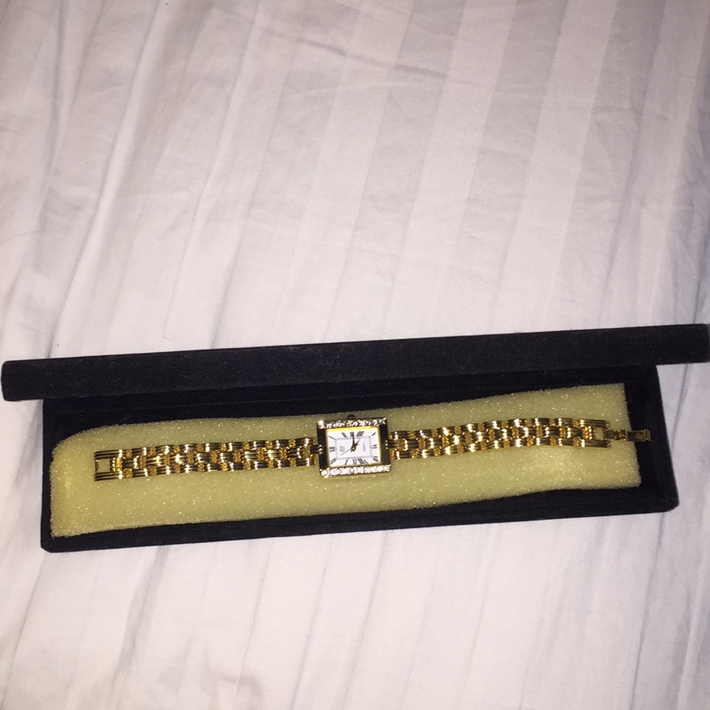 Gold watch, square face
